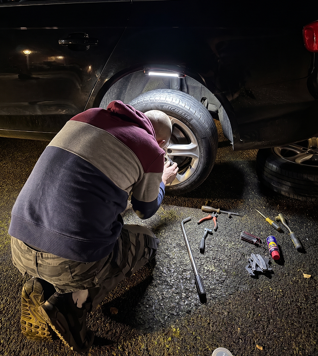MNTVLSAUTO mobile mechanic repairing a customer's car
